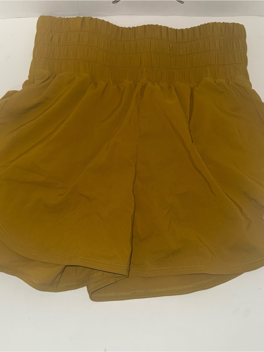Nike Dri-Fit High-Waist Smocked Waistband Women's Shorts in Mustard